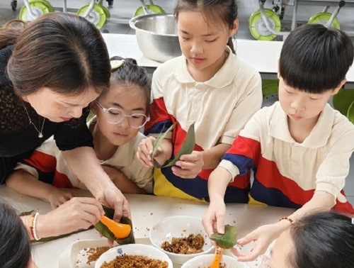 诸暨市海亮小学开展迎端午系列活动